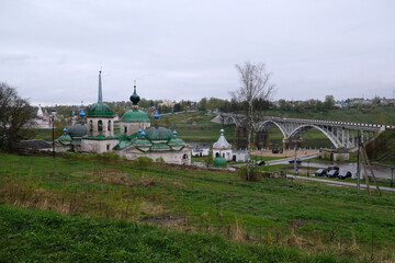 Fototapeta premium view of the old church in rainy weather, Staritsa town