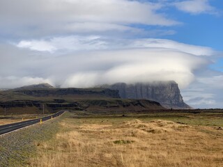 Iceland Landscape with road and clouds