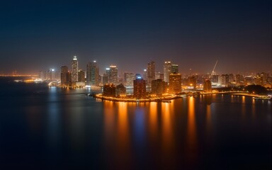 Naklejka premium Night Cityscape on Island Golden Lights and Bokeh Background. High quality