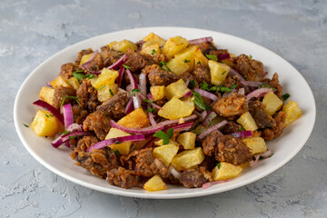 Liver pan (Albanian liver) Turkish traditional food. Liver over rice. (Turkish name; arnavut ciger)