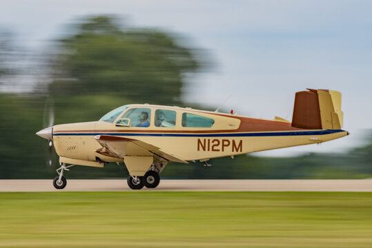 Beechcraft Bonanza V-Tail Classic Light Aircraft Taking Off