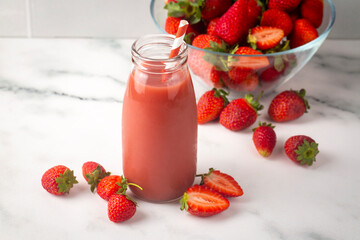 Strawberry smoothie or milkshake drink.