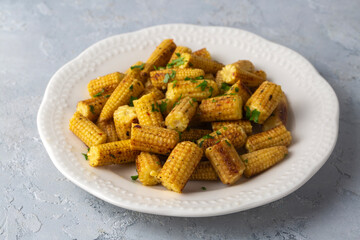Fried  or grilled corn with various spices