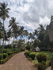 Fototapeta premium A small stone temple located in the middle of nature, symbolizing spirituality and harmony.