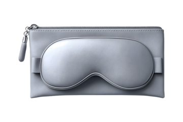 Elegant silver sleep mask nestled atop a matching pouch against a transparent background