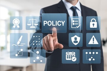 Obraz premium A business professional interacts with a transparent touchscreen interface displaying various policy-related icons.