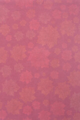 sophisticated scrapbooking paper with various sized maple leaf shape contours in red and orange