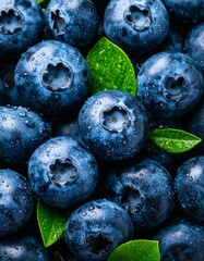 Close-up of fresh blueberries with leaves
