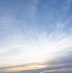 Beautiful morning or evening blue and orange sky with cloudy while sunsets or sunrises taken at the sea used as natural background texture