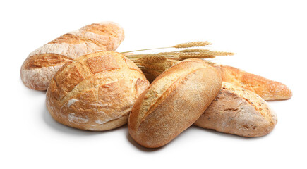 Different types of bread and spikes on white background