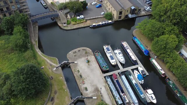 aerial drone view of Brighouse Basin a former inland port on the Calder and Hebble Navigation canal now a mooring for house boats and leisure craft