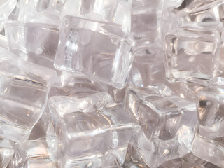 Abstract background of clear ice cubes with a cool blue and gray tone