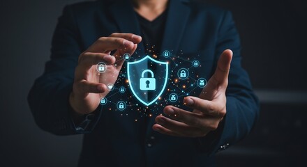 Businessman Displaying Digital Security Concept with Glowing Padlock Shield and Connected Icons, Illustrating Cyber Protection and Data Privacy