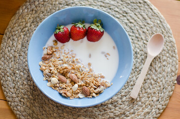Bowl with Milk and Fresh Strawberries