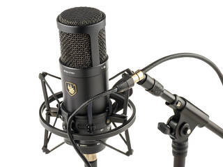 Professional Studio Condenser Microphone on a Black Background for High Quality Recording and Broadcasting Audio Sound