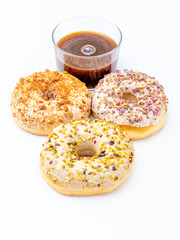 Glazed and decorated donuts perfect for a sweet treat or dessert