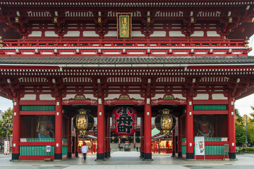 The Sensō-ji Temple in Tokyo at dawn, featuring the iconic giant red lantern of the Kaminarimon gate, glowing softly in the morning light, symbolizing tradition, spirituality, and heritage. © Riccardo Saponi
