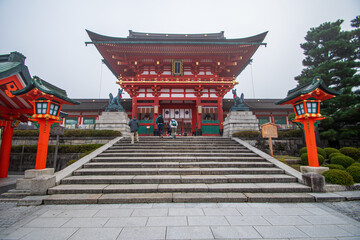Exterior views of Fushimi Inari Shrine in Kyoto, showing its main buildings and traditional Shinto architecture, a sacred site famous for its heritage, spirituality, and cultural significance.