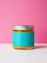 Vibrant Turmeric Paste in Glass Jar with Customizable Label on Pink Background for Healthy Cooking and Natural Remedy Concepts Product Mockup