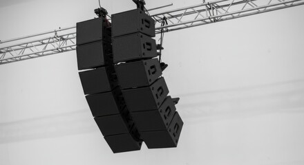 Suspended Sound - A Stark Monochrome View of a Concert Line Array Speaker Rig.