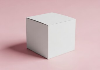 Naklejka premium Blank white cube shaped box on pale pink background minimalist design mockup simple packaging studio shot