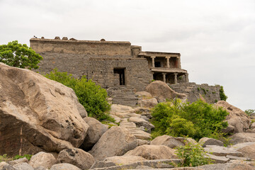A large stone building with a small door