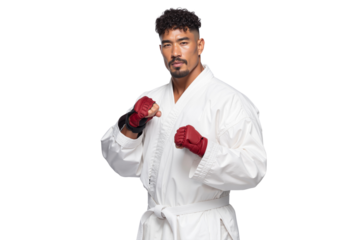 Asian man in a taekwondo uniform and red gloves poses confidently, ready for the fight, isolated on transparent background