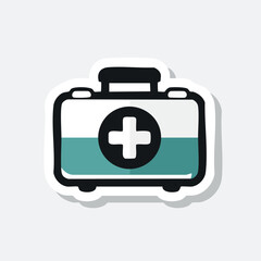 A sticker of a first aid kit with a white cross on a black circle.