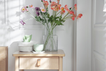 Bedside table with different decor at home