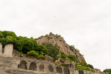 A mountain with a wall on the side