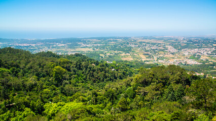 Fototapeta premium Sintra, Portugal - July 8 2025: The panoramic view from Castle of the Moors in Sintra, Portugal