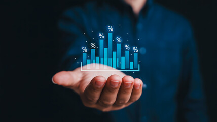 Hand holding digital financial growth chart image