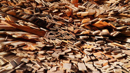 wooden planks pile haphazardly