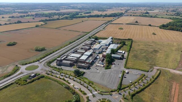 Aerial drone view of research sicence park buildings, Motor Industry Research association in England UK Europe sunny day Leicestershire 