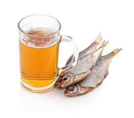 Glass of beer with dried fish snack isolated on white.