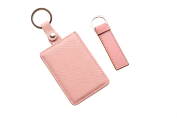 Two pink leather keychains with metal rings isolated on transparent background