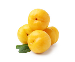 Yellow cherry plums with leaves isolated on white