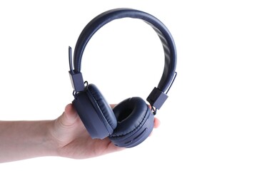 Woman with stylish blue headphones on white background, closeup