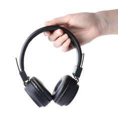 Woman with stylish black headphones on white background, closeup