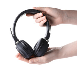 Woman with stylish black headphones on white background, closeup