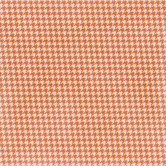 White and burnt orange houndstooth pattern. abstract geometric seamless pattern.