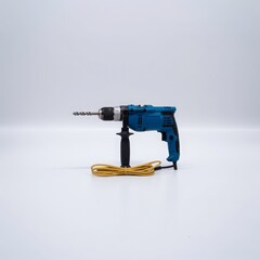 Blue power drill with yellow cord blue drill power tool