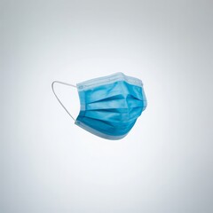 Blue pleated medical face covering mask