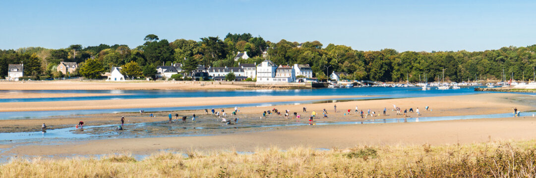 Guidel morbihan clohars carnoet finistere Sandy Beach with Seaside Village in the Distance