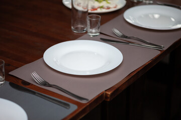 Plate with cutlery. Restaurant table setting