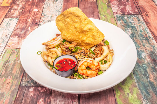 Northern chaufa with spicy chorizo, fried yuca, and cilantro, a Creole version that enhances the flavors of traditional chifa