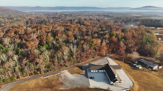 Aerial drone view of autumn landscape in USA with morning fog