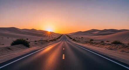 Fototapeta premium Straight desert road at golden sunset, reflecting vibrant sky colors on the asphalt, surrounded by sand dunes.