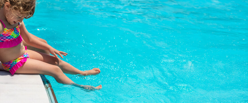 Children girls swimming in the pool. selective focus.