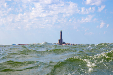 Bengtskar Lighthouse near Hanko, Finland. Tallest lighthouse in Scandinavia, rising above Baltic Sea, surrounded by rocky islands. Historic maritime landmark and popular tourist destination